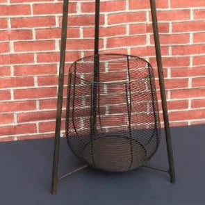 Bottom portion of the iron stand showing a circular metal mesh basket between the legs.