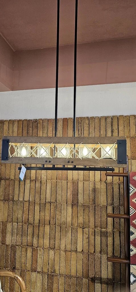 Full view of the same farmhouse chandelier showing the dual rod suspension. Perfect for dining or kitchen islands with a warm industrial look.