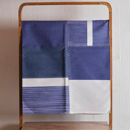Patchwork Neel block print durrie in deep blue and white artistic textile piece with clean finish.
