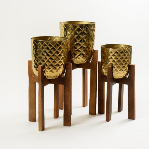 Set of 3 gold textured planters with wooden stands modern indoor plant holders for elegant home decor.