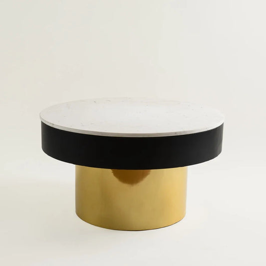 Closeup of modern round marble-top table with chess set and tea cup