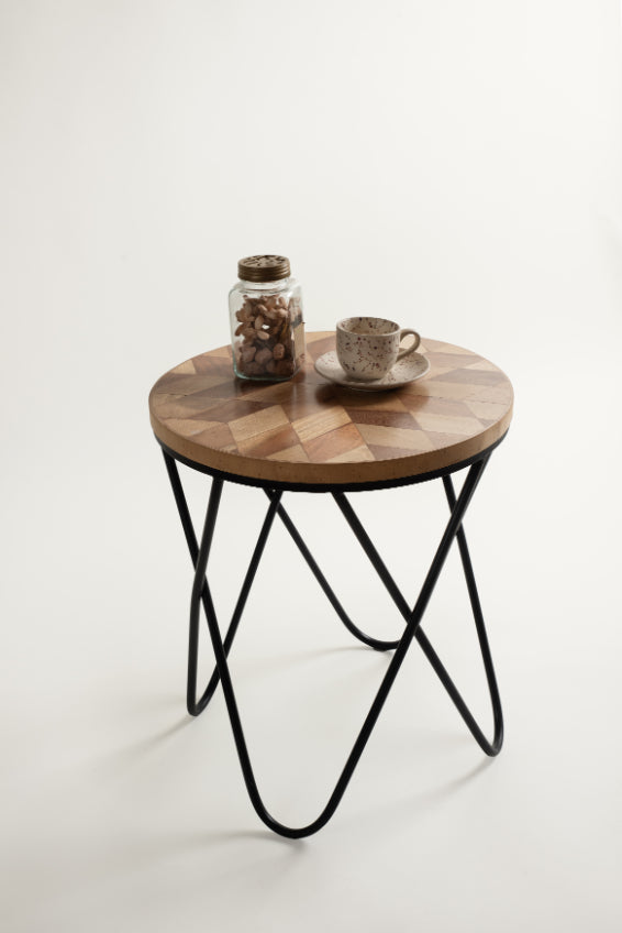 Geometric wood inlay side table with modern iron frame.