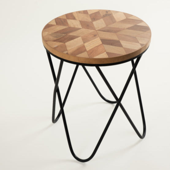 Modern wooden top side table with criss-cross metal legs.