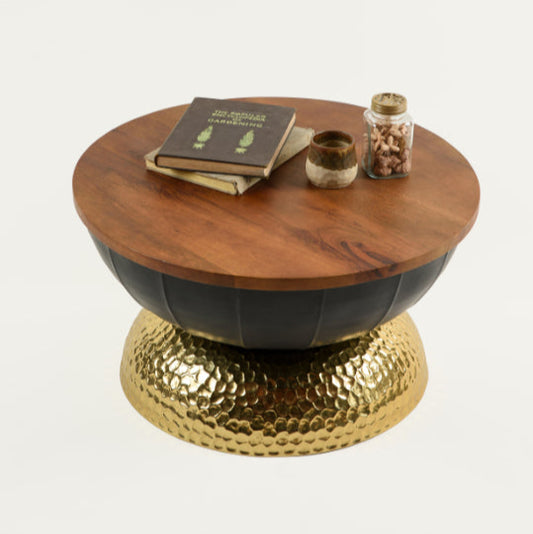Valentina coffee table featuring a rich wooden top, black bowl-shaped body, and golden hammered base – luxurious Troika Life design.