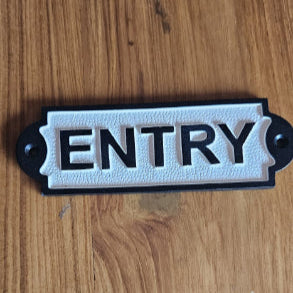 Rectangular cast iron sign with bold black letters reading “ENTRY” on a white enamel background – vintage wall decor by Troika.